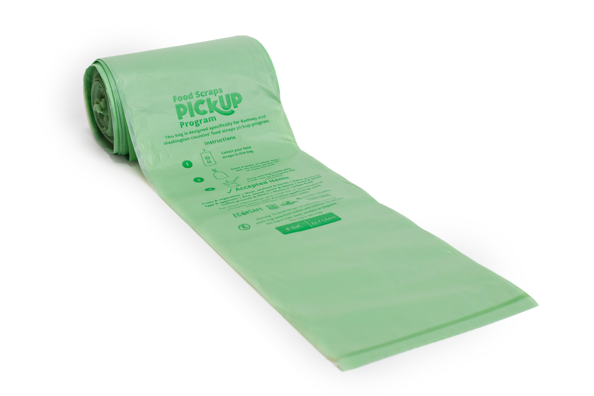 full roll of green compostable bags
